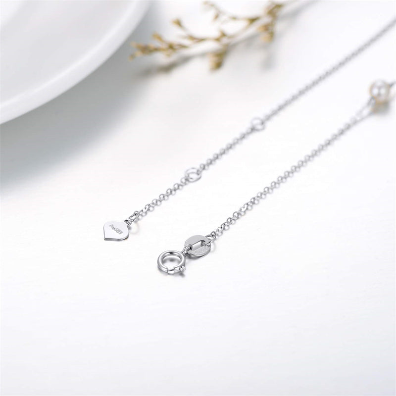 14k Gold Pearl Love Knot Infinity Bracelet