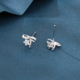 925 Sterling Silver Elegant Silver Bow Earrings With Zircon-accented Flowers On Blue Velvet
