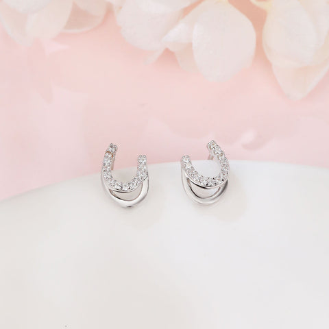 925 Sterling Silver **title:** Elegant Horseshoe Zircon Stud Earrings In Sterling Silver