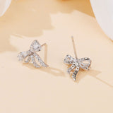 925 Sterling Silver Elegant Zircon-encrusted Plated with White Gold Bow Earrings