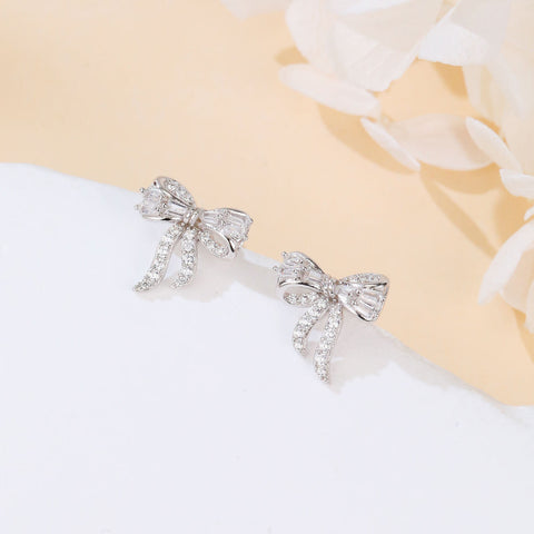 925 Sterling Silver Elegant Zircon-encrusted Plated with White Gold Bow Earrings