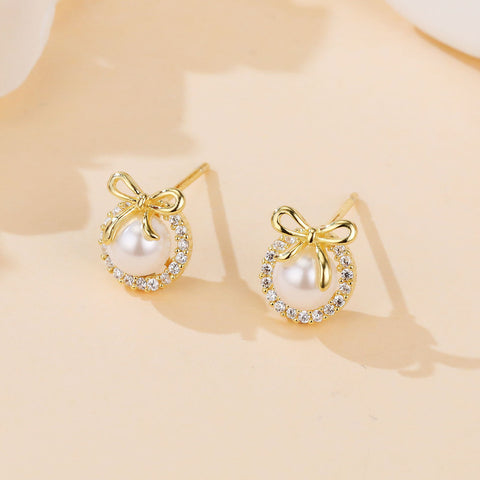 925 Sterling Silver Elegant Pearl Earrings With Zircon Accents And Gold Bow Design