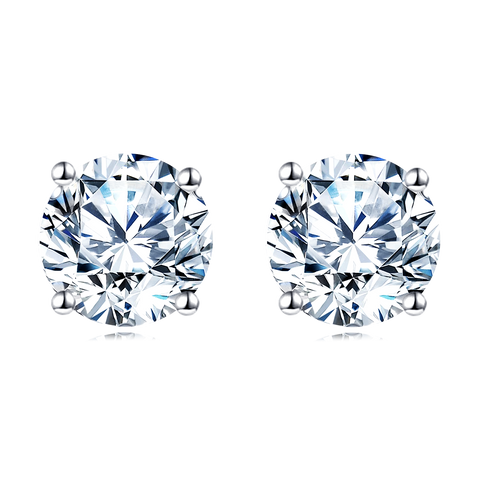 925 Sterling Silver Elegant Sparkling Moissanite Stud Earrings In Plated with White Gold On Blush Pink Backdrop