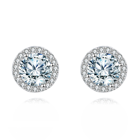 925 Sterling Silver Elegant Moissanite Halo Stud Earrings On Black Wood With Teal Background