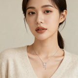 925 Sterling Silver Eternal Moonlight Moissanite-studded Crescent Necklace With Stellar Charms In Plated with White Gold