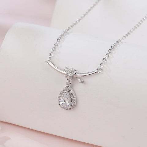 925 Sterling Silver Elegant Zircon Teardrop Necklace With Bow Accent In Sterling Silver