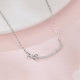 925 Sterling Silver Elegant Silver Zircon Bow Necklace With Curved Bar Pendant