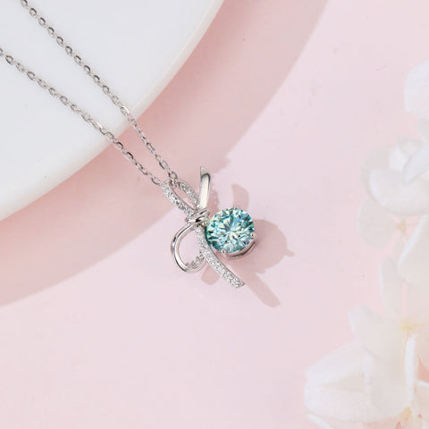 925 Sterling Silver Elegant Silver Bow Pendant Necklace With Light Blue Moissanite Centerpiece