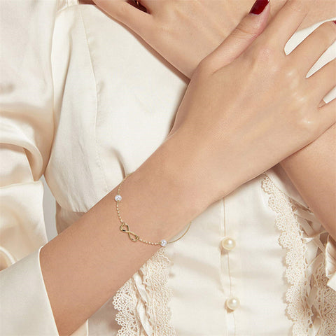 14k Gold Pearl Love Knot Infinity Bracelet